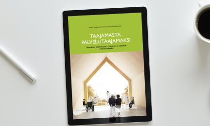 Työpöytä, jolla tabletissa auki "Taajamasta palvelutaajamaksi"-erillisjulkaisun kansi.